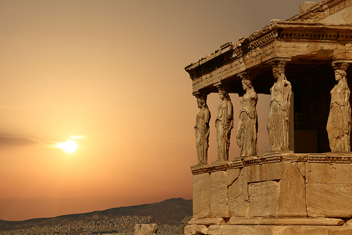 Caryatids on the Athenian Acropolis at sunset Greece