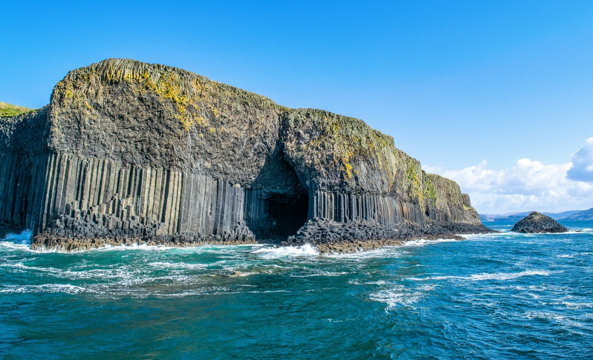 Fingal cave entrance under-geometric-natural-cliff of Staffa Island